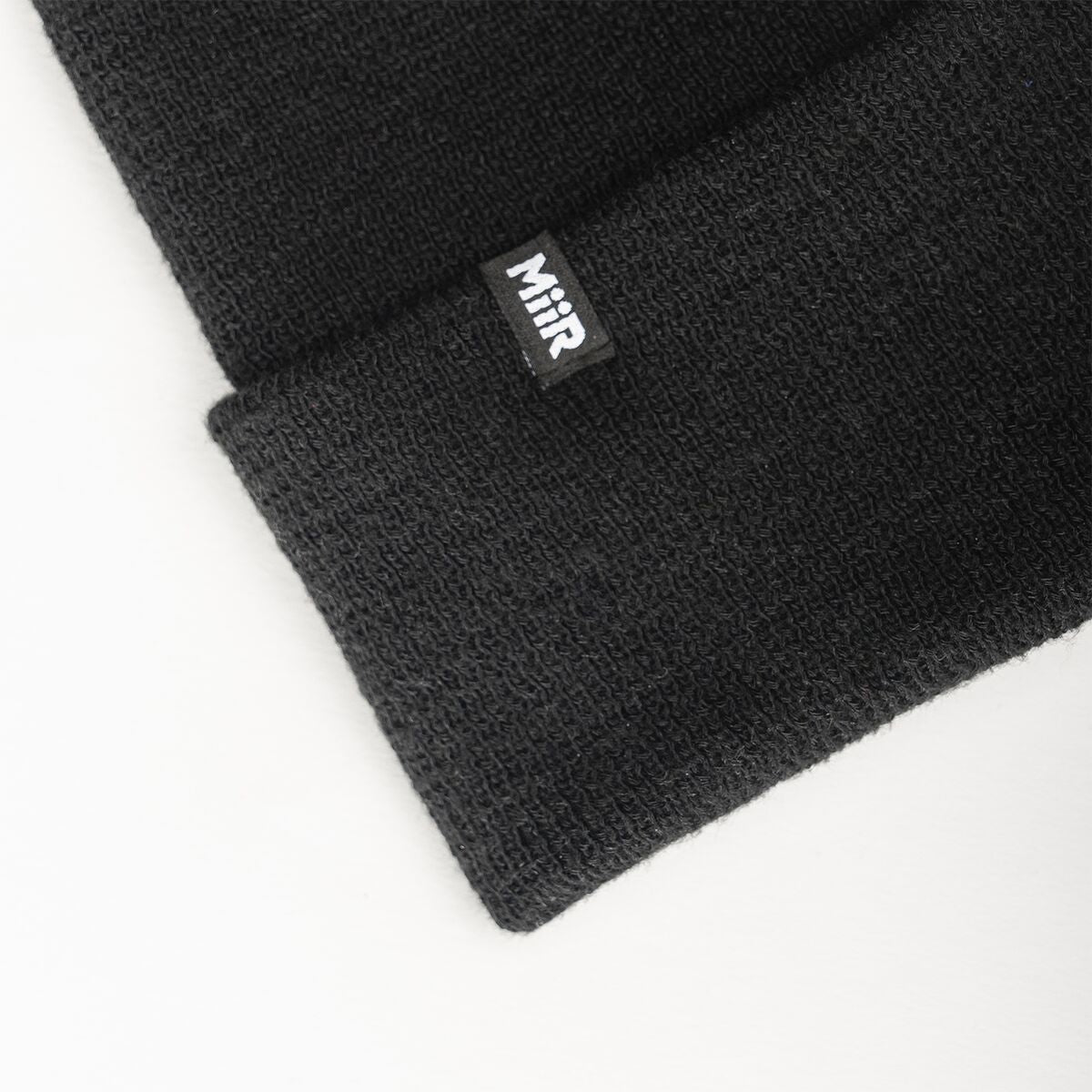 recycled-poly-fine-knit-beanie-h2 WebPDP-RecycledPolyFineKnitBeanie_Studio_TagDetail_Black__BNE005002OS.jpg